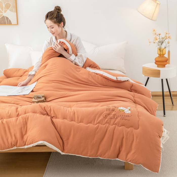 91家纺网 家纺一手货源 找家纺 钰博2023新款水洗棉麻立体被大豆被直播爆款冬被被子被芯 暖橙色