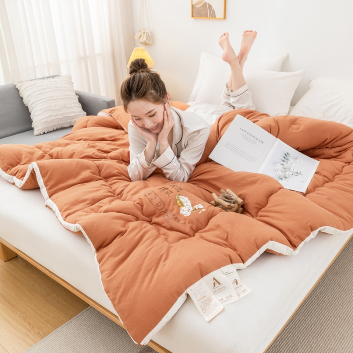 91家纺网 家纺一手货源 找家纺 钰博2023新款水洗棉麻立体被大豆被直播爆款冬被被子被芯 暖橙色