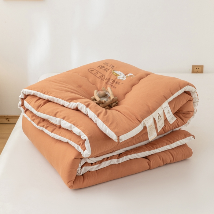 91家纺网 家纺一手货源 找家纺 钰博2023新款水洗棉麻立体被大豆被直播爆款冬被被子被芯 暖橙色