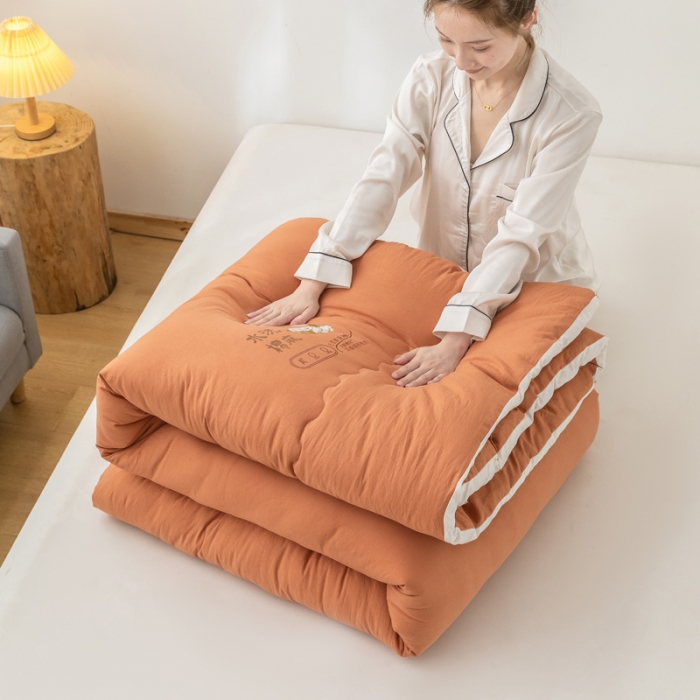 91家纺网 家纺一手货源 找家纺 钰博2023新款水洗棉麻立体被大豆被直播爆款冬被被子被芯 暖橙色