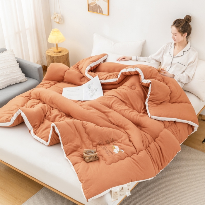 91家纺网 家纺一手货源 找家纺 钰博2023新款水洗棉麻立体被大豆被直播爆款冬被被子被芯 暖橙色