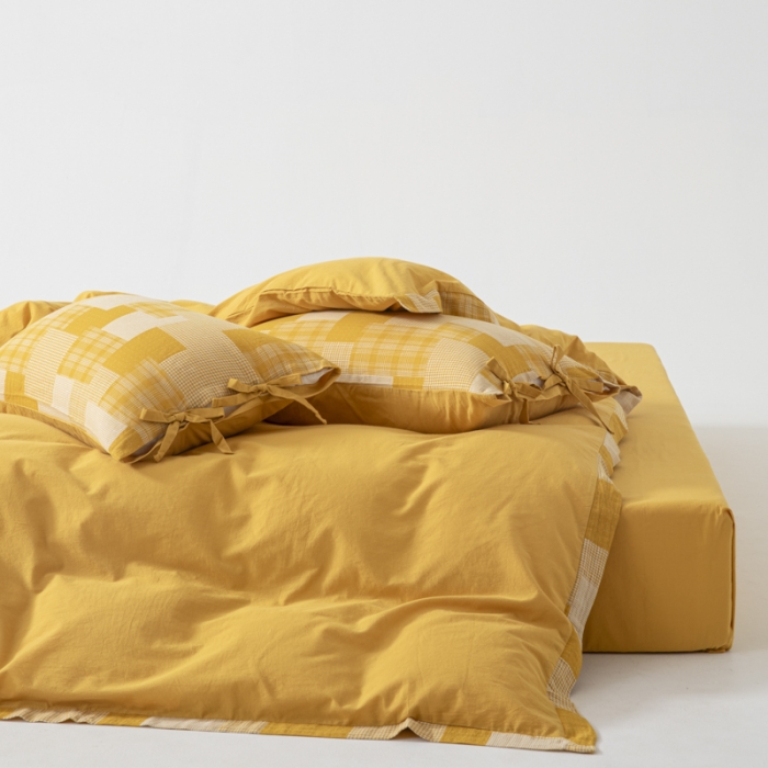 91家纺网 家纺一手货源 找家纺 安莱生活 2023新款简约拼布田园拼边四件套 姜黄