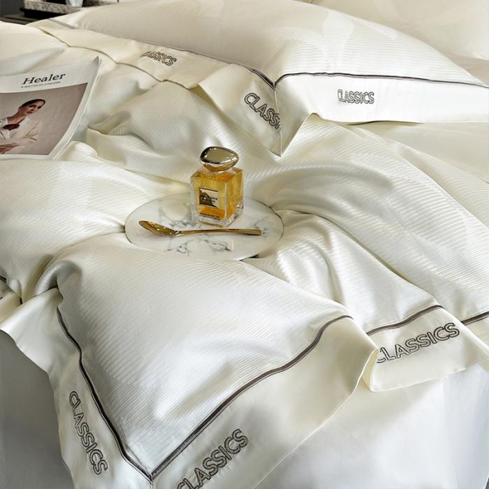 91家纺网 家纺一手货源 找家纺 新款100支长绒棉提花拼角刺绣套件