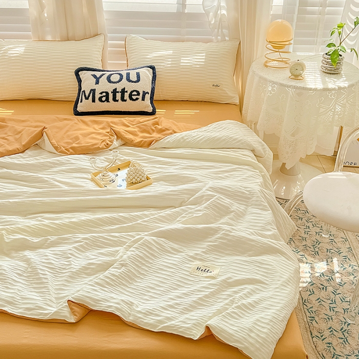 91家纺网 家纺一手货源 找家纺 暖芯优选 2023新款韩版泡泡纱水洗棉拼色床单夏被四件套 米白橙