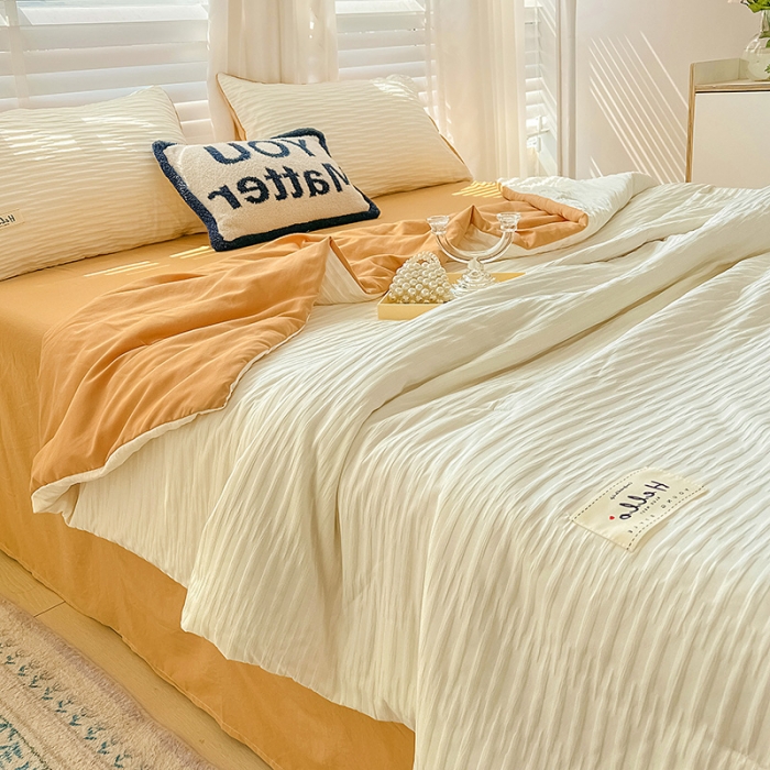 91家纺网 家纺一手货源 找家纺 暖芯优选 2023新款韩版泡泡纱水洗棉拼色床单夏被四件套 米白橙