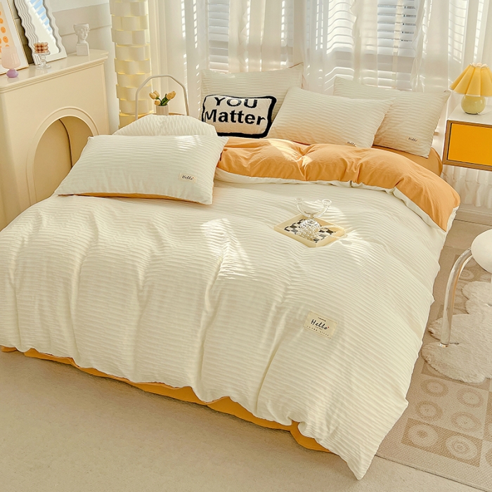 91家纺网 家纺一手货源 找家纺 暖芯优选 2023新款韩版泡泡纱水洗棉拼色床单床笠四件套 米白橙