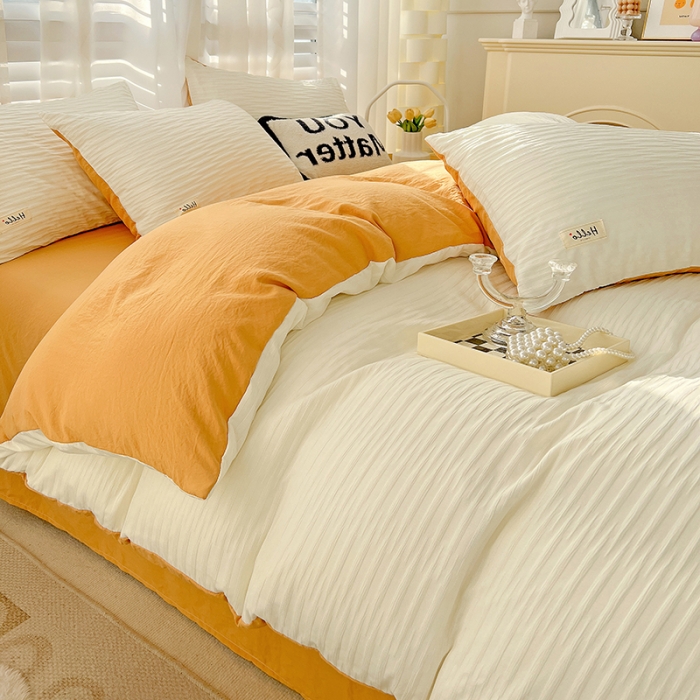 91家纺网 家纺一手货源 找家纺 暖芯优选 2023新款韩版泡泡纱水洗棉拼色床单床笠四件套 米白橙