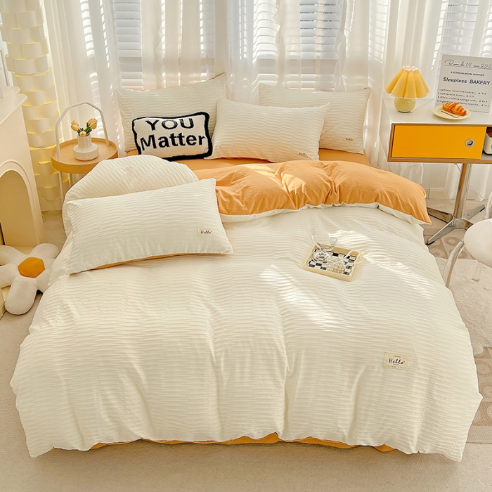 91家纺网 家纺一手货源 找家纺 暖芯优选 2023新款韩版泡泡纱水洗棉拼色床单床笠四件套 米白橙