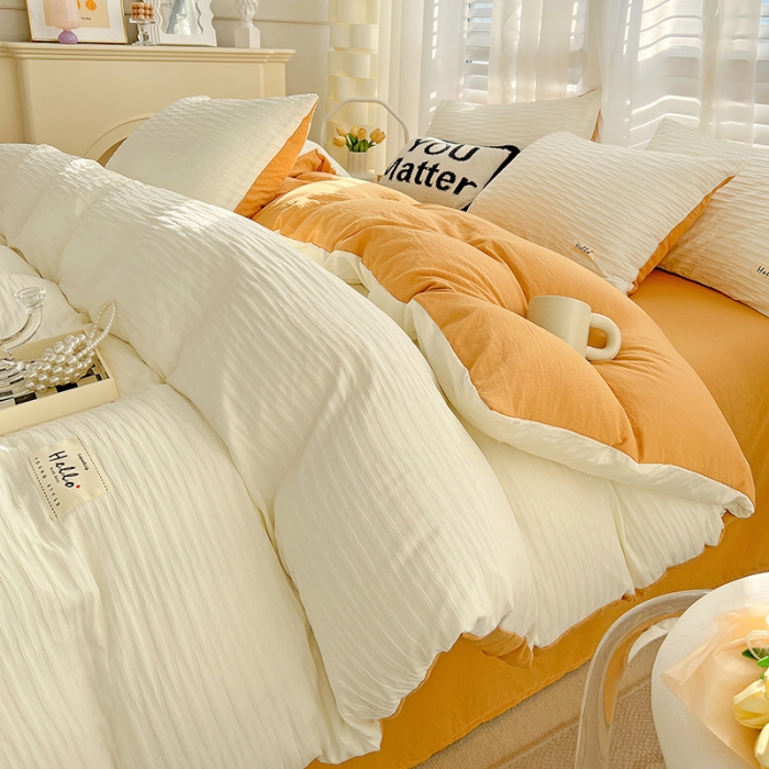 91家纺网 家纺一手货源 找家纺 暖芯优选 2023新款韩版泡泡纱水洗棉拼色床单床笠四件套 米白橙