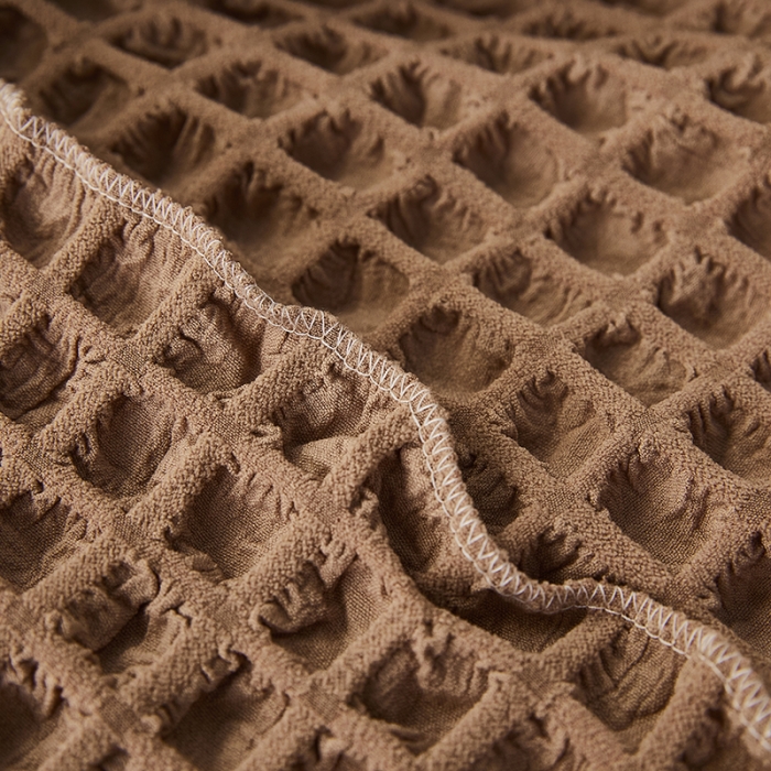 91家纺网 家纺一手货源 找家纺 丝绮鹿 2023新款爆米花系列全包沙发套裙边款双扶手 驼色