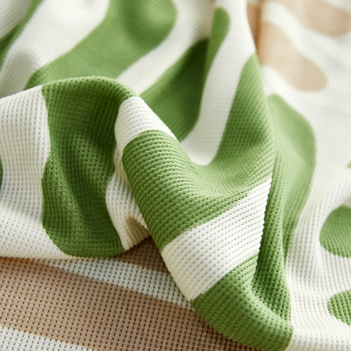 91家纺网 家纺一手货源 找家纺 丝绮鹿 2023新款针织柔肤格沙发床套裙边款 米绿条纹