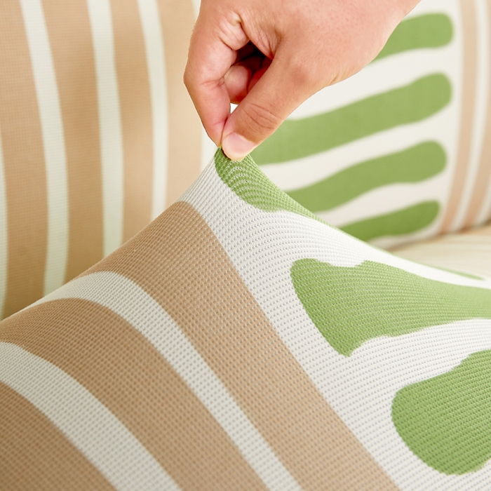 91家纺网 家纺一手货源 找家纺 丝绮鹿 2023新款针织柔肤格沙发套（裙边款） 米绿条纹