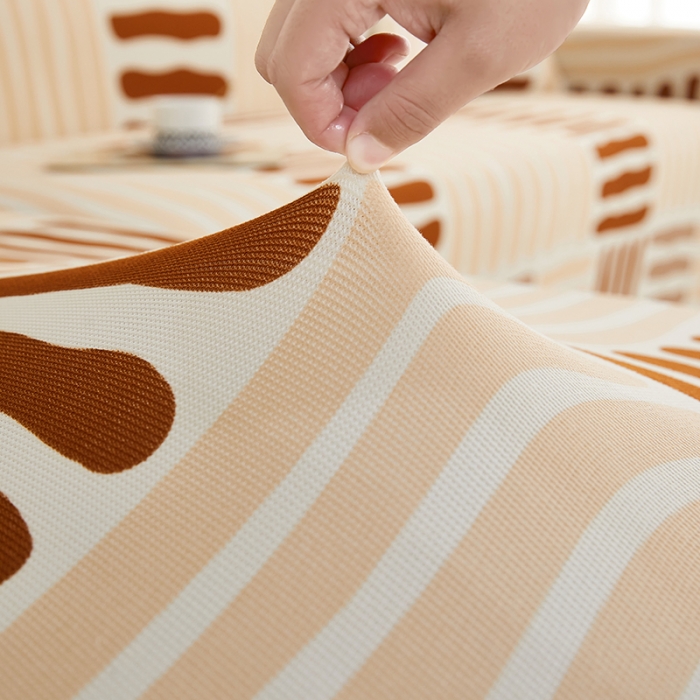 91家纺网 家纺一手货源 找家纺 丝绮鹿2023针织柔肤格贵妃沙发套松紧款 买一个沙发套默认送一个抱枕套 米咖条纹