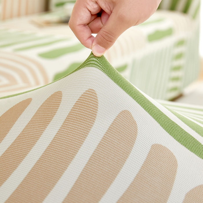 91家纺网 家纺一手货源 找家纺 丝绮鹿2023针织柔肤格贵妃沙发套松紧款 买一个沙发套默认送一个抱枕套 米绿条纹