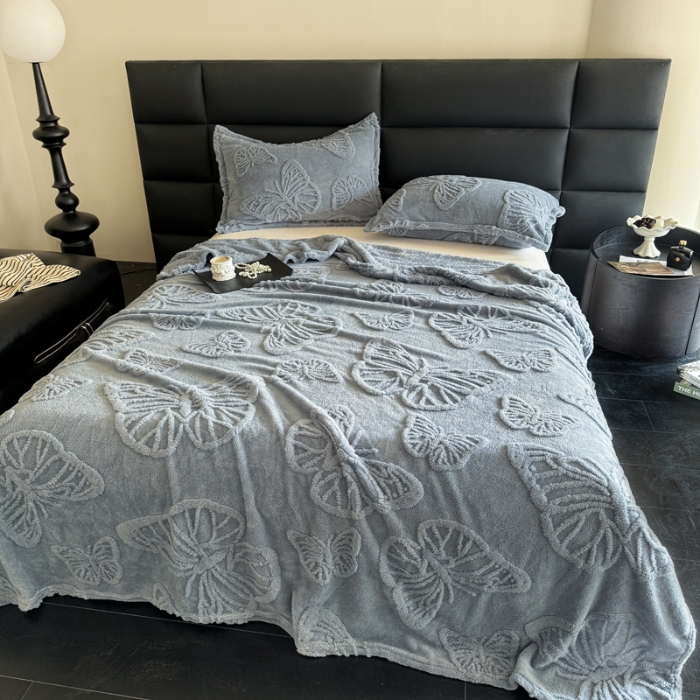 91家纺网 家纺一手货源 找家纺 2025款塔芙绒蝴蝶提花毛毯 纯色多功能休闲盖毯 爆款花型 电商/直播/外贸/跨境专供  蝴蝶蓝