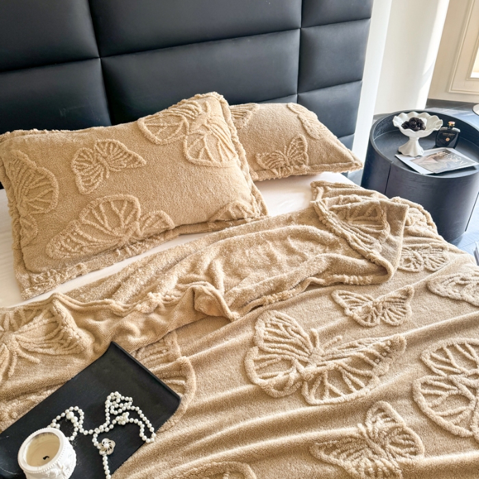 91家纺网 家纺一手货源 找家纺 2025款塔芙绒蝴蝶提花毛毯 纯色多功能休闲盖毯 爆款花型 电商/直播/外贸/跨境专供  蝴蝶驼