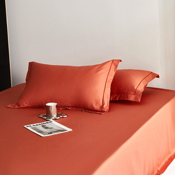 91家纺网 家纺一手货源 找家纺 2025年新款100支纯棉长绒棉全棉贡缎纯色枕套 南瓜红