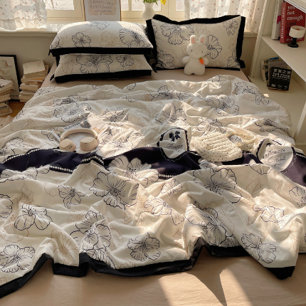91家纺网 家纺一手货源 找家纺 （总）花伞家居 2025新款赫本高级感黑白系列花边水洗棉夏凉被夏被四件套