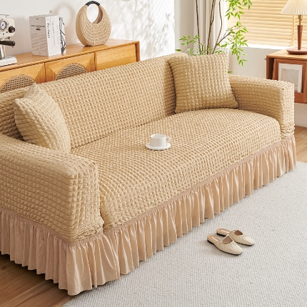 91家纺网 家纺一手货源 找家纺 （总）2025新款双色泡泡纱沙发套加厚裙摆款超弹全包懒人防滑沙发罩四季通用