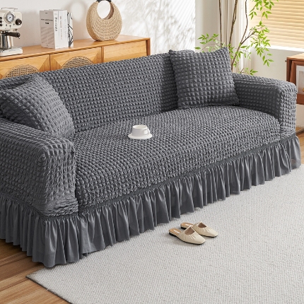 91家纺网 家纺一手货源 找家纺 （总）2025新款双色泡泡纱沙发套加厚裙摆款超弹全包懒人防滑沙发罩四季通用