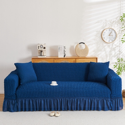 91家纺网 家纺一手货源 找家纺 （总）2025新款双色泡泡纱沙发套裙摆款超弹全包高级纯色沙发套一体式四季款