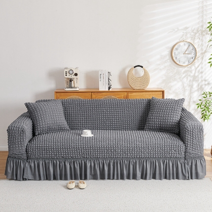 91家纺网 家纺一手货源 找家纺 （总）2025新款双色泡泡纱沙发套裙摆款超弹全包高级纯色沙发套一体式四季款