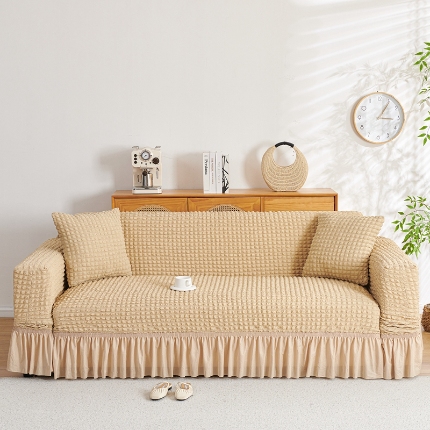 91家纺网 家纺一手货源 找家纺 （总）2025新款双色泡泡纱沙发套裙摆款超弹全包高级纯色沙发套一体式四季款