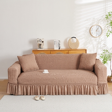 91家纺网 家纺一手货源 找家纺 （总）2025新款双色泡泡纱沙发套裙摆款超弹全包高级纯色沙发套一体式四季款