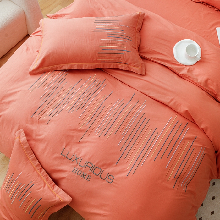 91家纺网 家纺一手货源 找家纺 2025年高端轻奢刺绣款全棉长绒棉四件套简约纯色素色纯棉刺绣花四件套件床单 太阳橙