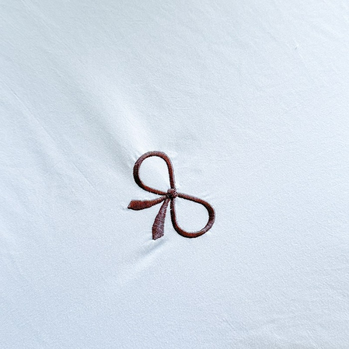 91家纺网 家纺一手货源 找家纺 漫步云家纺2025春夏新品韩版花边超柔水洗棉纯棉全棉蝴蝶结刺绣四件套    蝶儿飞飞—婴儿蓝 