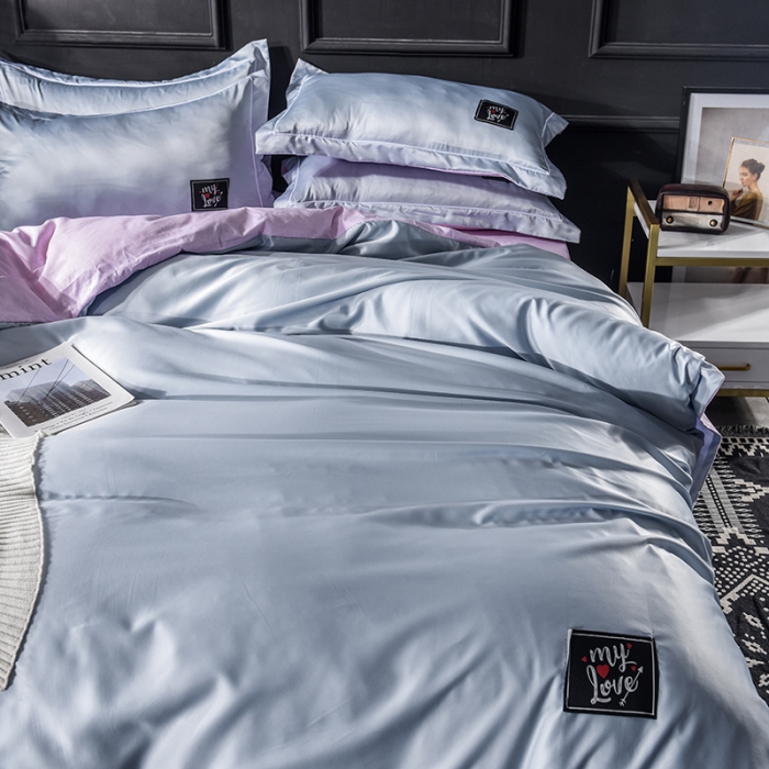 91家纺网 家纺一手货源 找家纺 欧冠 2019新款水洗真丝贴布绣四件套 床单款 浅蓝粉