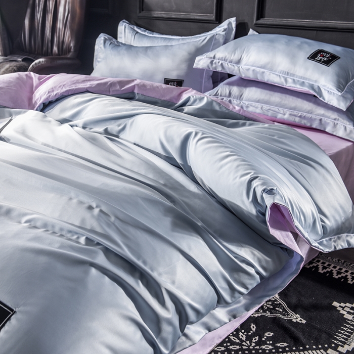 91家纺网 家纺一手货源 找家纺 绒世界 2019新款水洗真丝贴布绣四件套 床单款 浅蓝粉