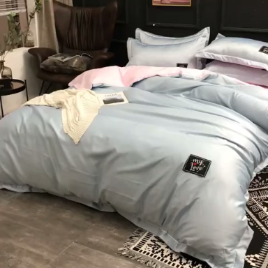 91家纺网 家纺一手货源 找家纺 欧冠 2019新款水洗真丝贴布绣四件套 床单款 浅蓝粉