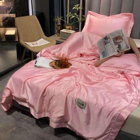 91家纺网 家纺一手货源 找家纺 换种生活 水洗天丝镂空夏被羽丝棉 果冻橙