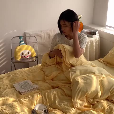 91家纺网 家纺一手货源 找家纺 ab家纺 2023新款泡泡纱水洗棉四件套 泡泡纱姜黄