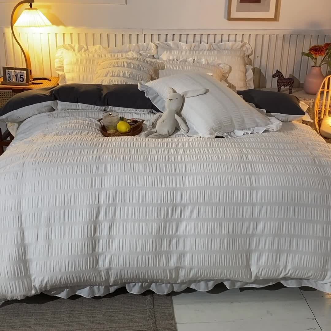 91家纺网 家纺一手货源 找家纺 慕澄 2022新款公主风泡泡纱花边四件套 梨花白＋灰