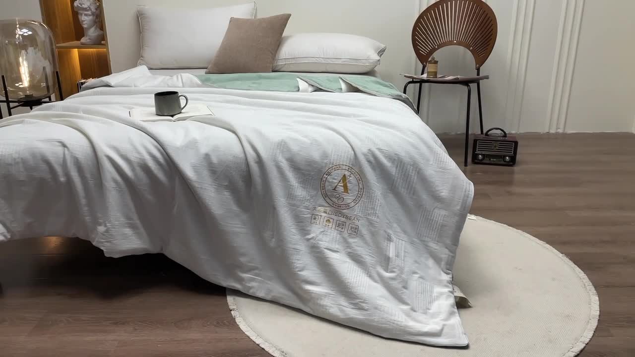 91家纺网 家纺一手货源 找家纺 芯恋家居2025新款母婴级无印染大提花大豆春秋夏被 白绿