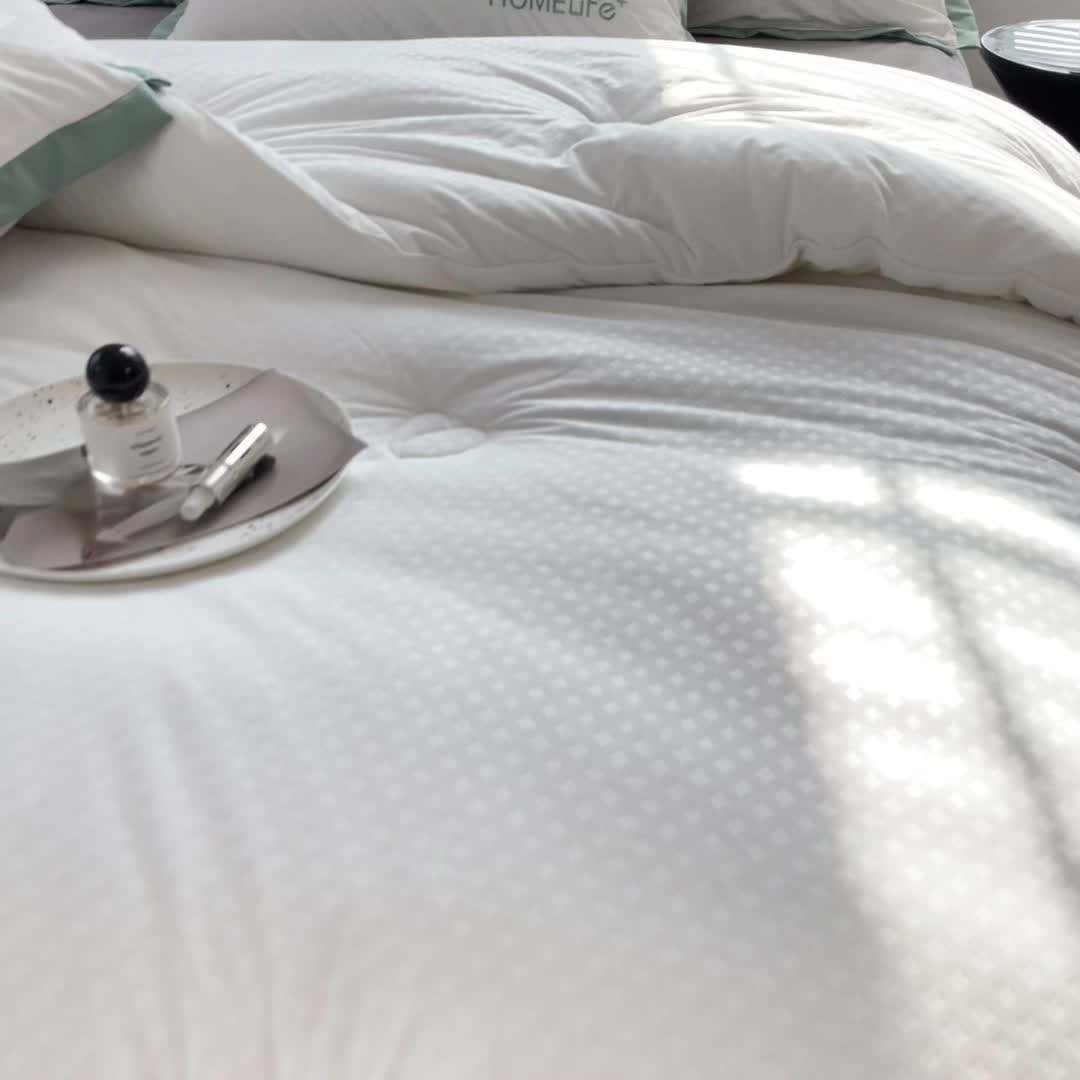 91家纺网 家纺一手货源 找家纺 全季直播A类大豆纤维暖棉绒提花冬被被子被芯 断角花边款奶琪白