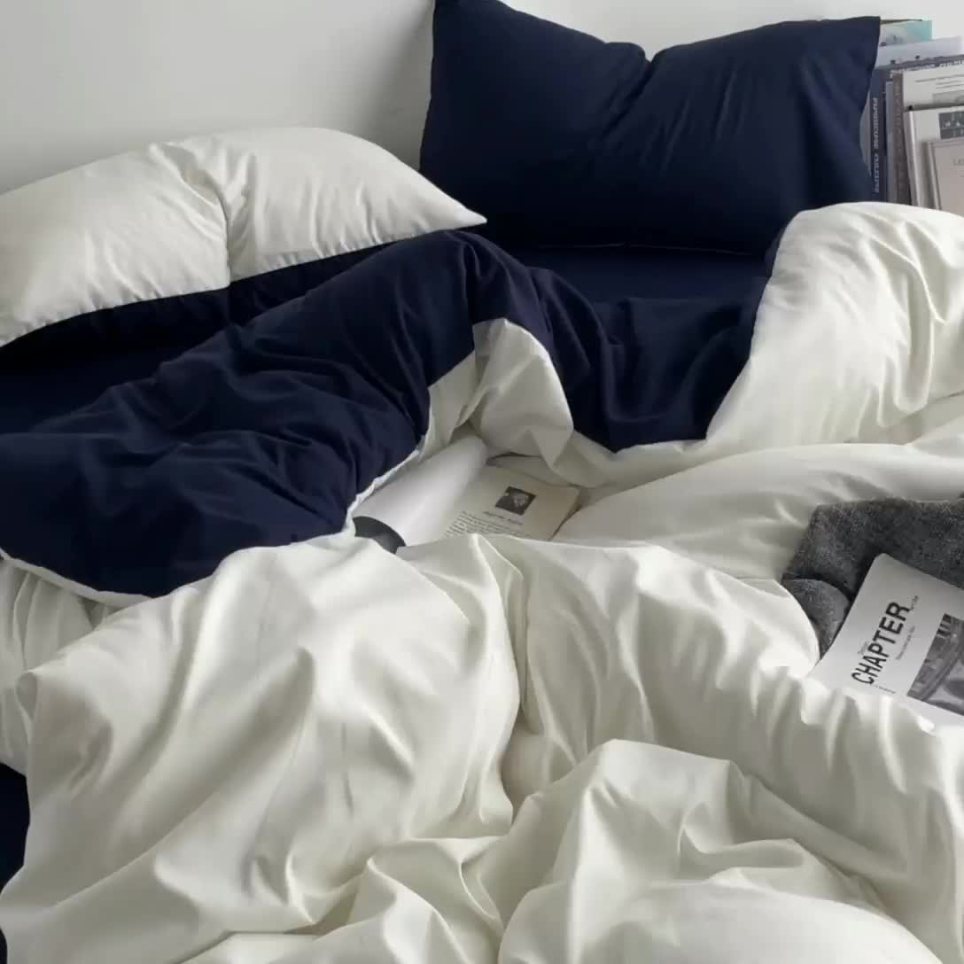 91家纺网 家纺一手货源 找家纺 贝拉梦 2023亲肤棉北欧简约风纯色双拼105g四件套白蓝灰