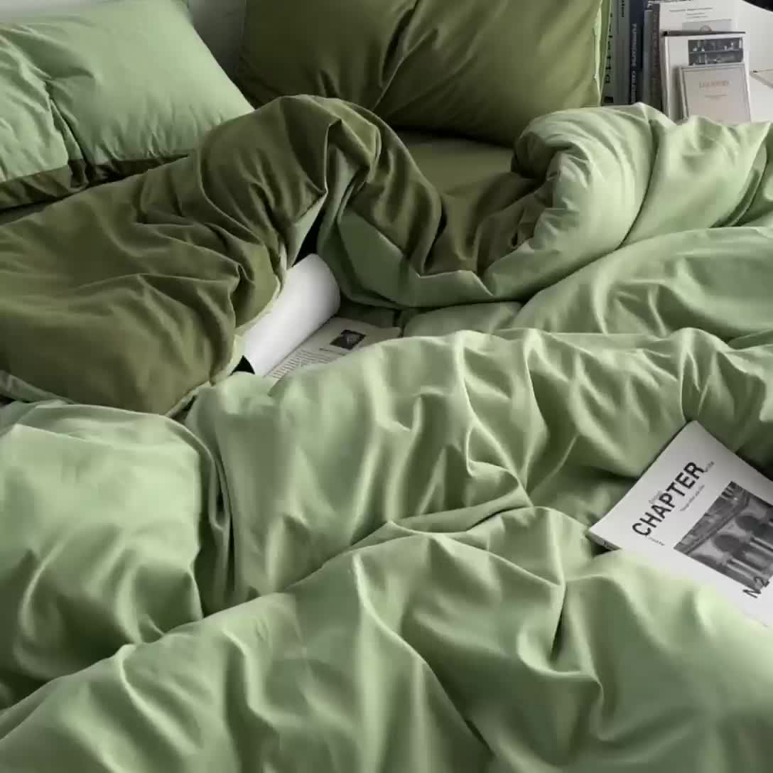 91家纺网 家纺一手货源 找家纺 贝拉梦 2023亲肤棉北欧简约风纯色双拼105G单品被套 奶绿深绿