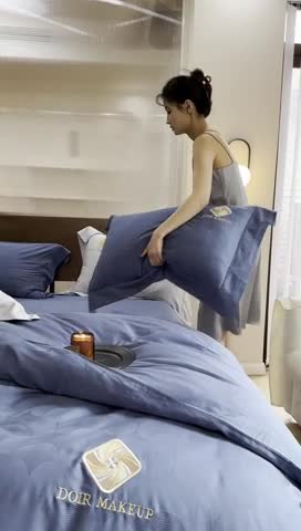 91家纺网 家纺一手货源 找家纺 棉邦 2023新款40支华夫格大提花纽扣款四件套 深蓝