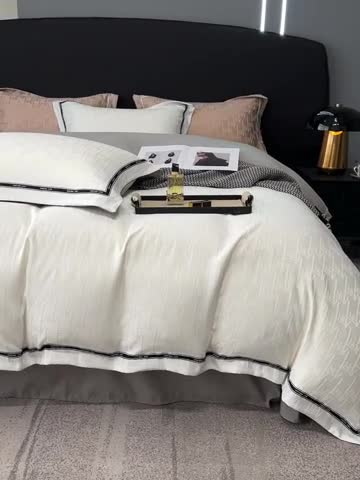 91家纺网 家纺一手货源 找家纺 优悦2023新款提花冰丝系列四件套 娜爱-白灰