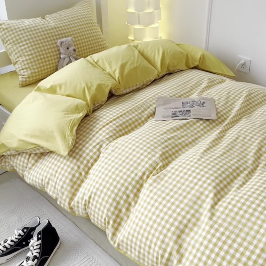 91家纺网 家纺一手货源 找家纺 盼季 2023新款无印风格子纯色水洗棉四件套 布丁黄
