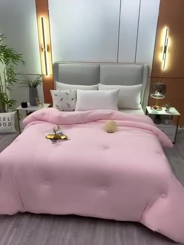 91家纺网 家纺一手货源 找家纺 天瑜家纺新款A类牛奶丝针织棉暖糯冬被春秋被被芯被子 粉色