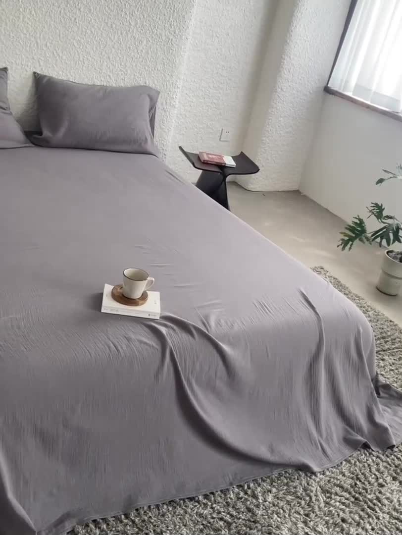 91家纺网 家纺一手货源 找家纺 安莱生活2024新款绉纱美拉德色纯色单品床单 水泥